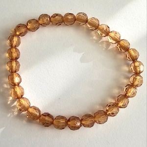 Bracelet stretch cord tan orange beads beaded. stretchy stacking layering